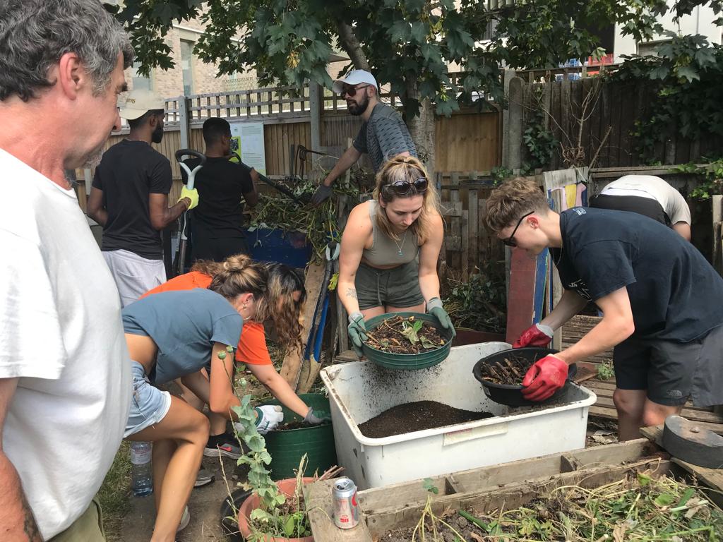 An image of some corporate Volunteers helping in the garden